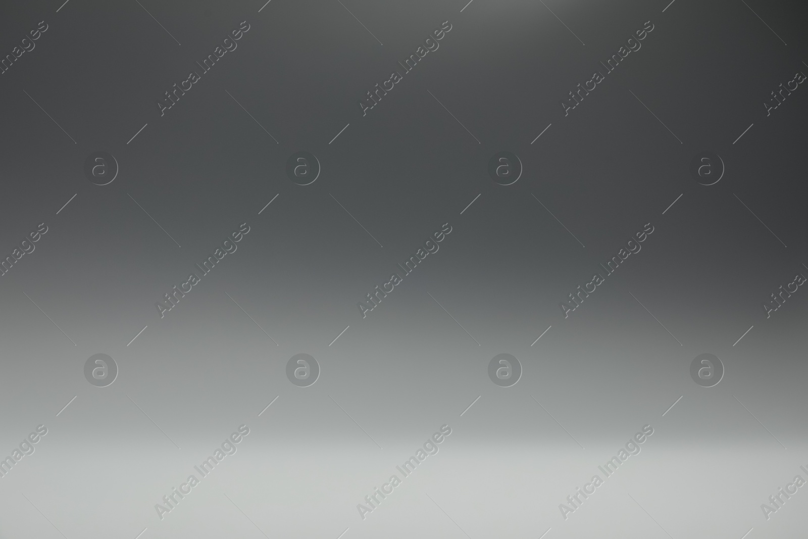 Photo of Grey gradient background. Abstract color backdrop for design