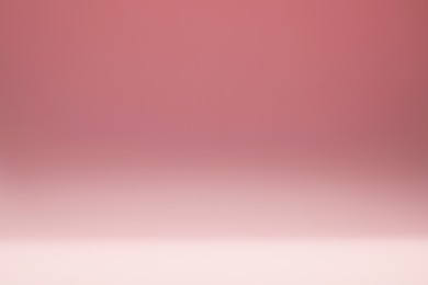 Photo of Dusty rose gradient background. Abstract color backdrop for design