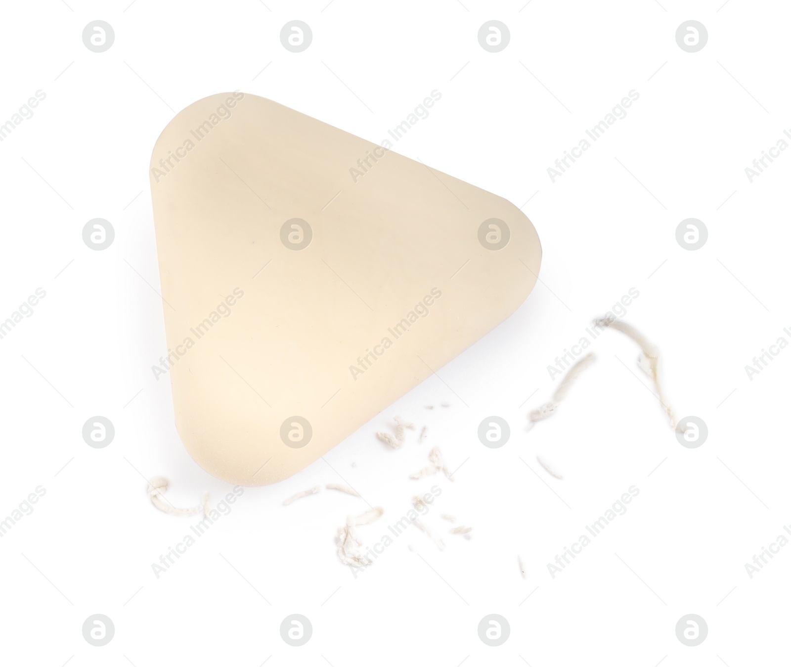 Photo of One eraser and scraps isolated on white, top view