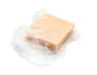 Photo of Bar soap with foam on white background