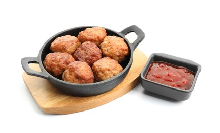 Photo of Tasty meatballs in baking dish and tomato sauce isolated on white