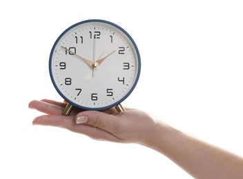 Photo of Woman with alarm clock on white background, closeup