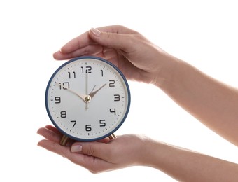 Photo of Woman with alarm clock on white background, closeup