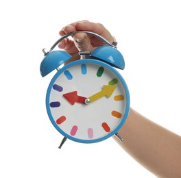 Photo of Woman with alarm clock on white background, closeup