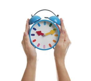 Photo of Woman with alarm clock on white background, closeup