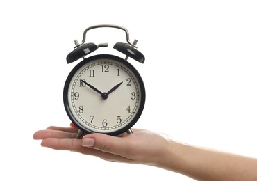 Photo of Woman with alarm clock on white background, closeup