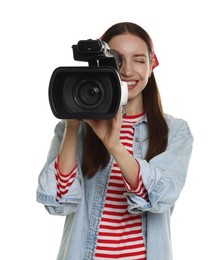 Photo of Happy woman with professional video camera on white background