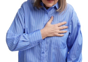 Heart attack. Senior woman suffering from pain in chest on white background, closeup