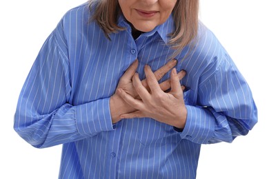 Heart attack. Senior woman suffering from pain in chest on white background, closeup