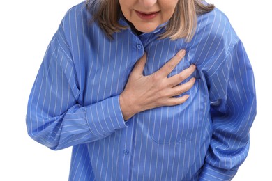 Photo of Heart attack. Senior woman suffering from pain in chest on white background, closeup