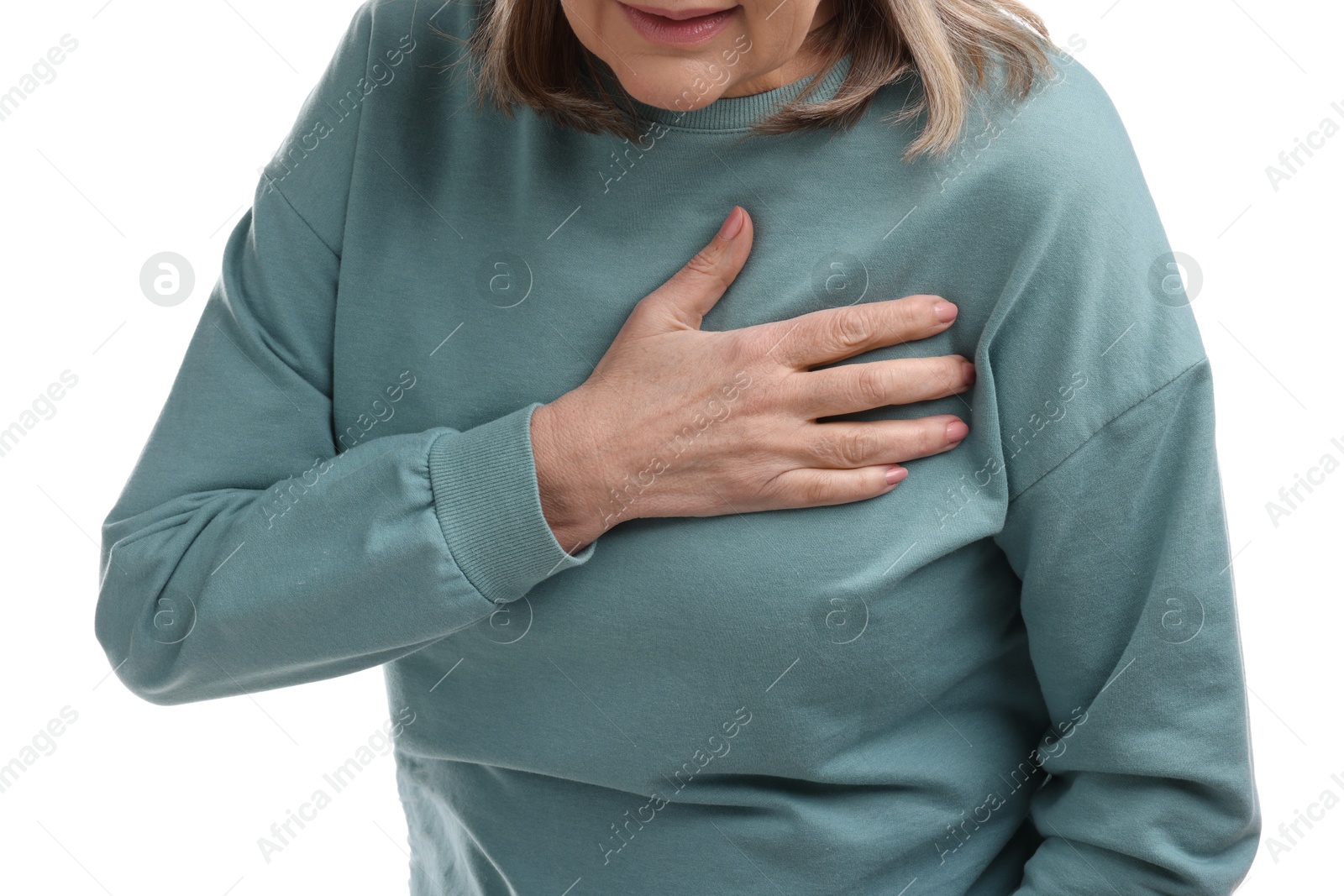 Photo of Heart attack. Senior woman suffering from pain in chest on white background, closeup