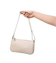 Photo of Woman with beautiful handbag on white background, closeup. Stylish accessory