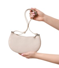 Photo of Woman with beautiful handbag on white background, closeup. Stylish accessory