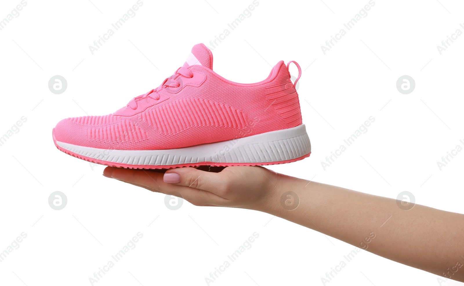 Photo of Woman with neon pink sneaker on white background, closeup