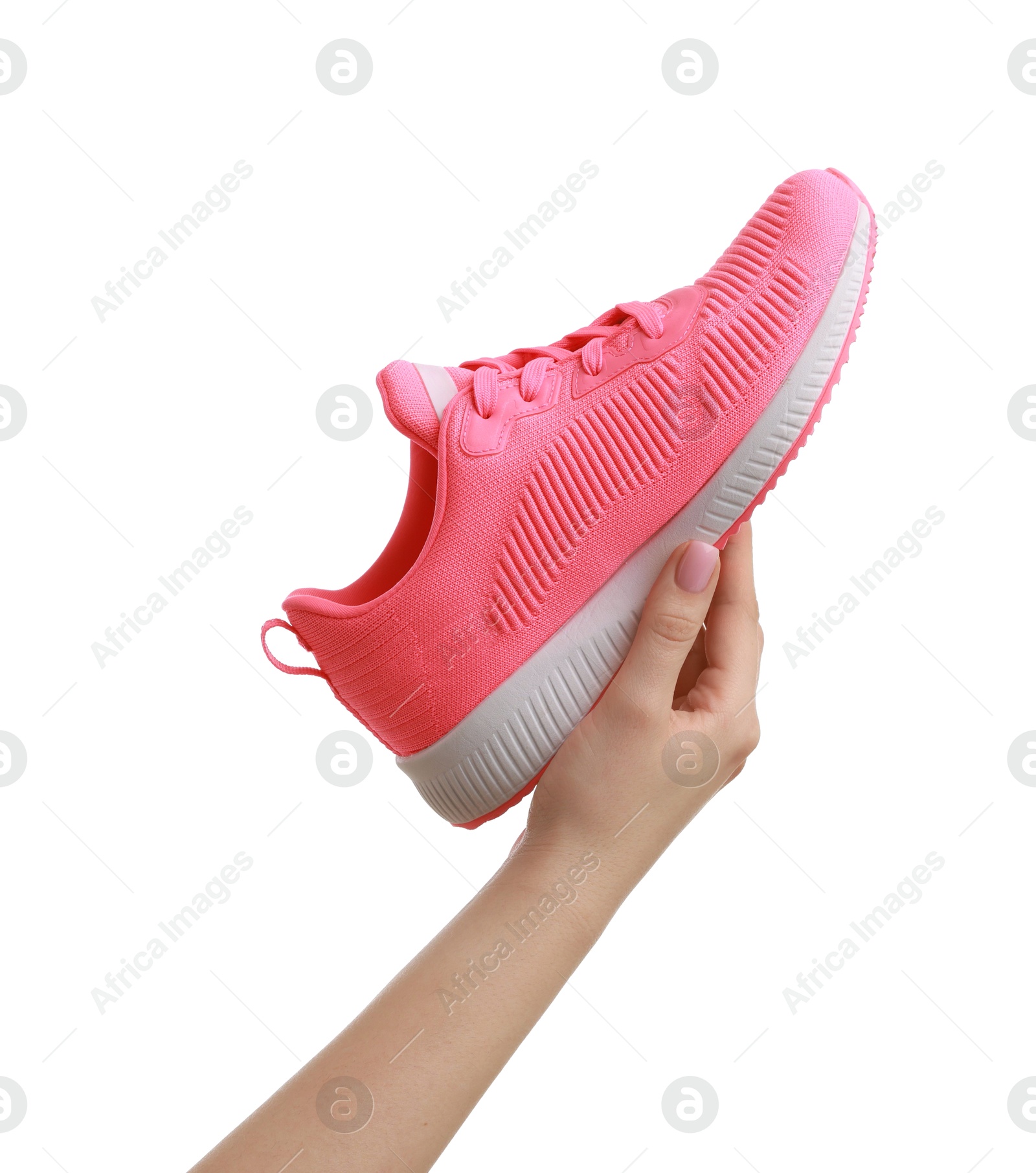 Photo of Woman with neon pink sneaker on white background, closeup