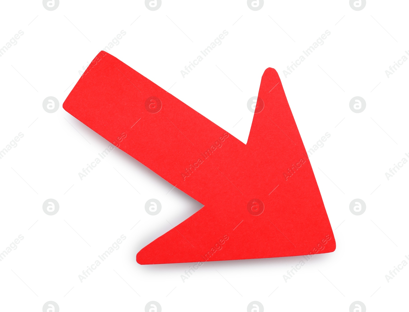 Photo of One red paper arrow isolated on white, top view