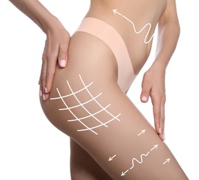 Woman showing her beautiful body with smooth skin on white background, closeup. Lines of anti-cellulite massage or lifting on skin