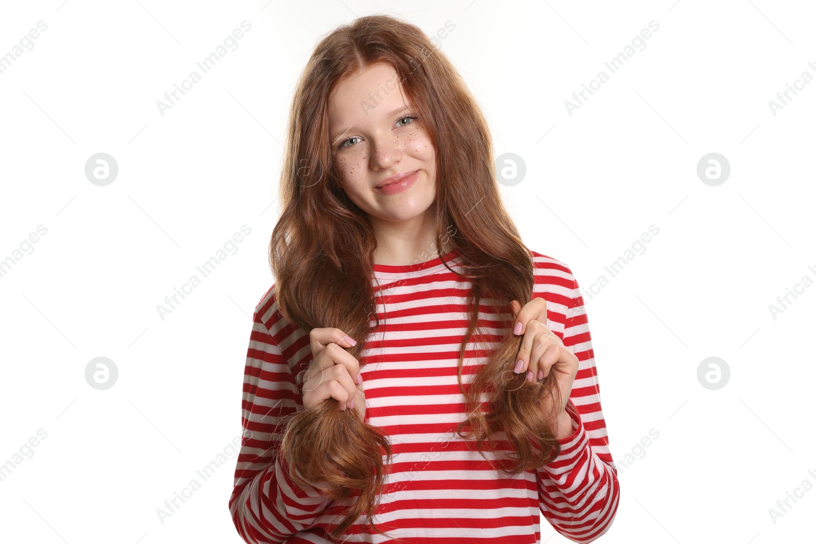 Photo of Beautiful teenage girl with freckles on white background