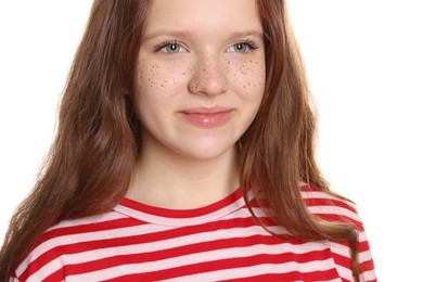 Photo of Beautiful teenage girl with freckles on white background, closeup