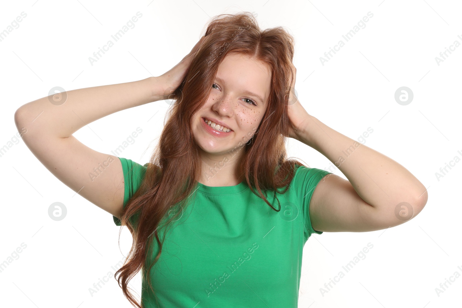 Photo of Beautiful teenage girl with freckles on white background