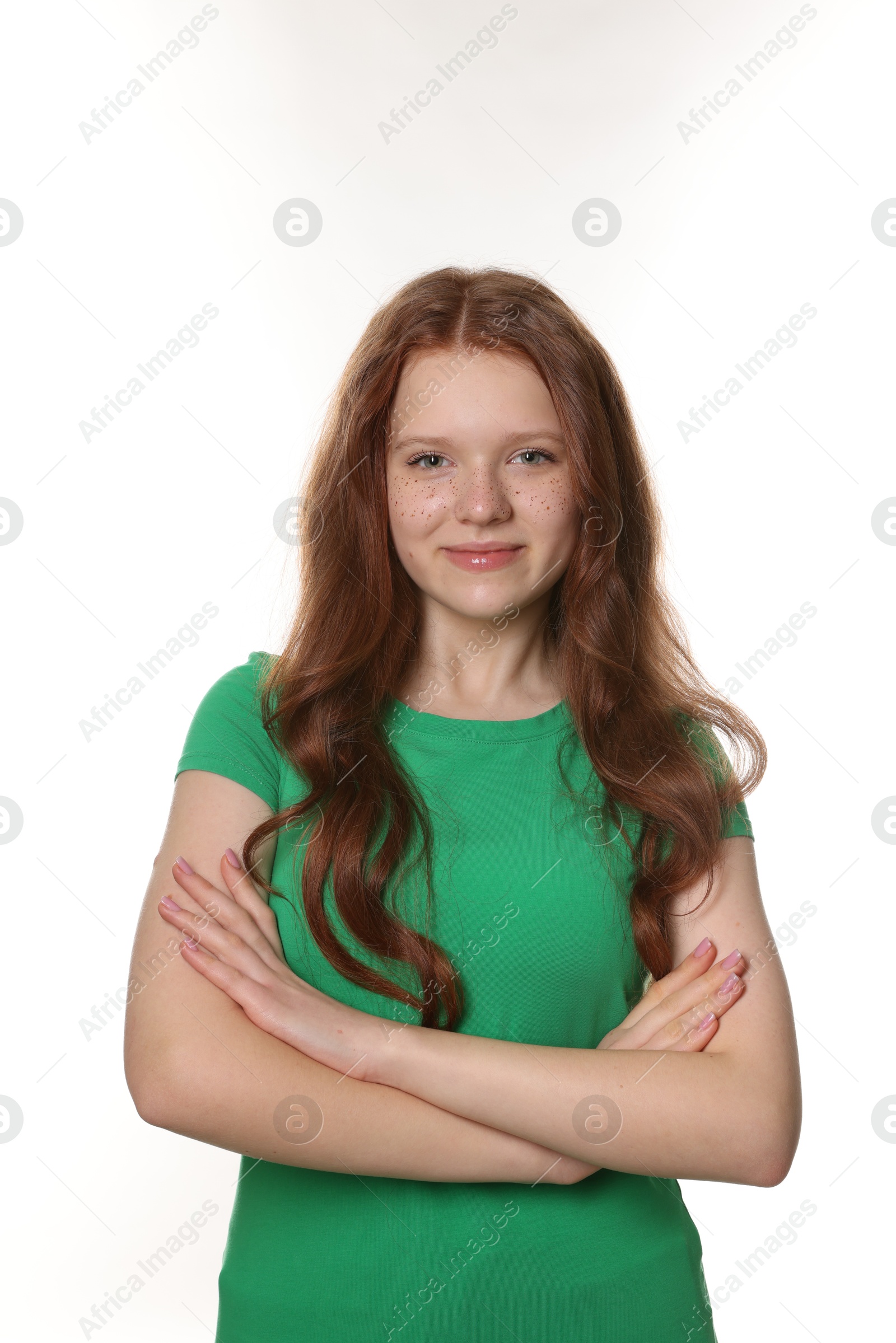 Photo of Beautiful teenage girl with freckles on white background