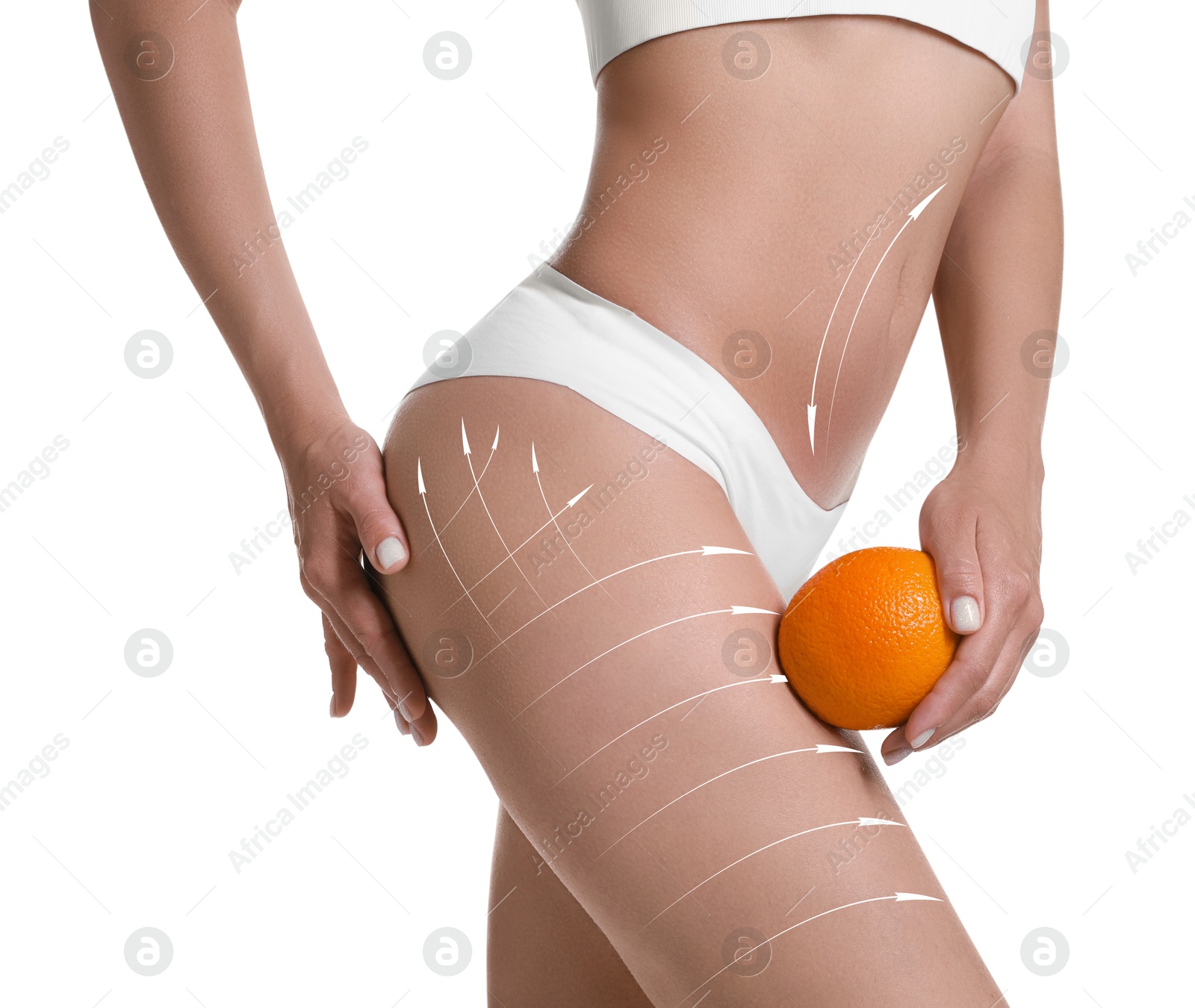 Image of Woman showing her beautiful body with smooth skin and holding orange on white background, closeup. Lines of anti-cellulite massage on skin