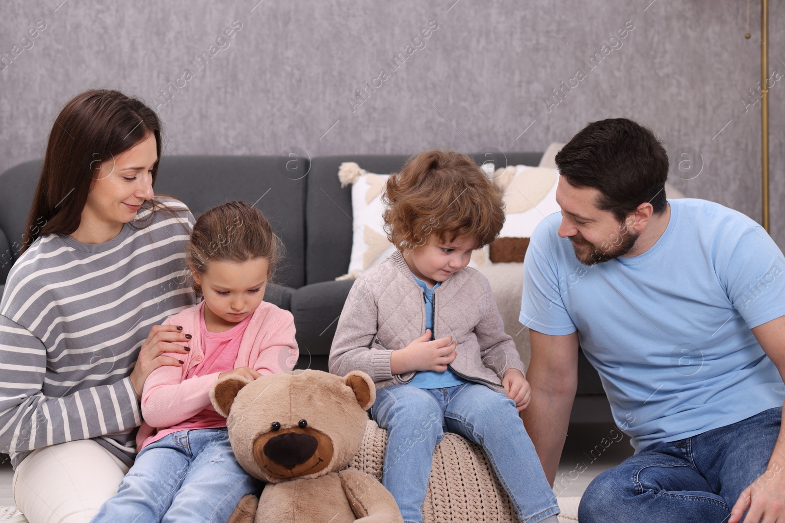 Photo of Resentful little kids and their parents arguing at home