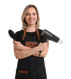 Photo of Smiling hairdresser with brush and dryer on white background