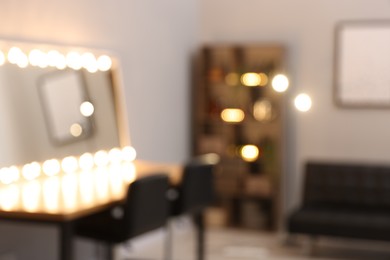 Photo of Blurred view of stylish beauty salon interior