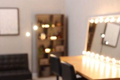 Photo of Blurred view of stylish beauty salon interior