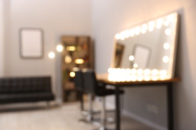 Photo of Blurred view of stylish beauty salon interior