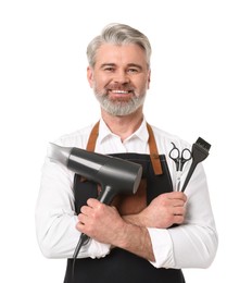 Photo of Smiling hairdresser with dryer, scissors and hair dye brush on white background