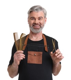 Photo of Smiling hairdresser with combs and scissors on white background