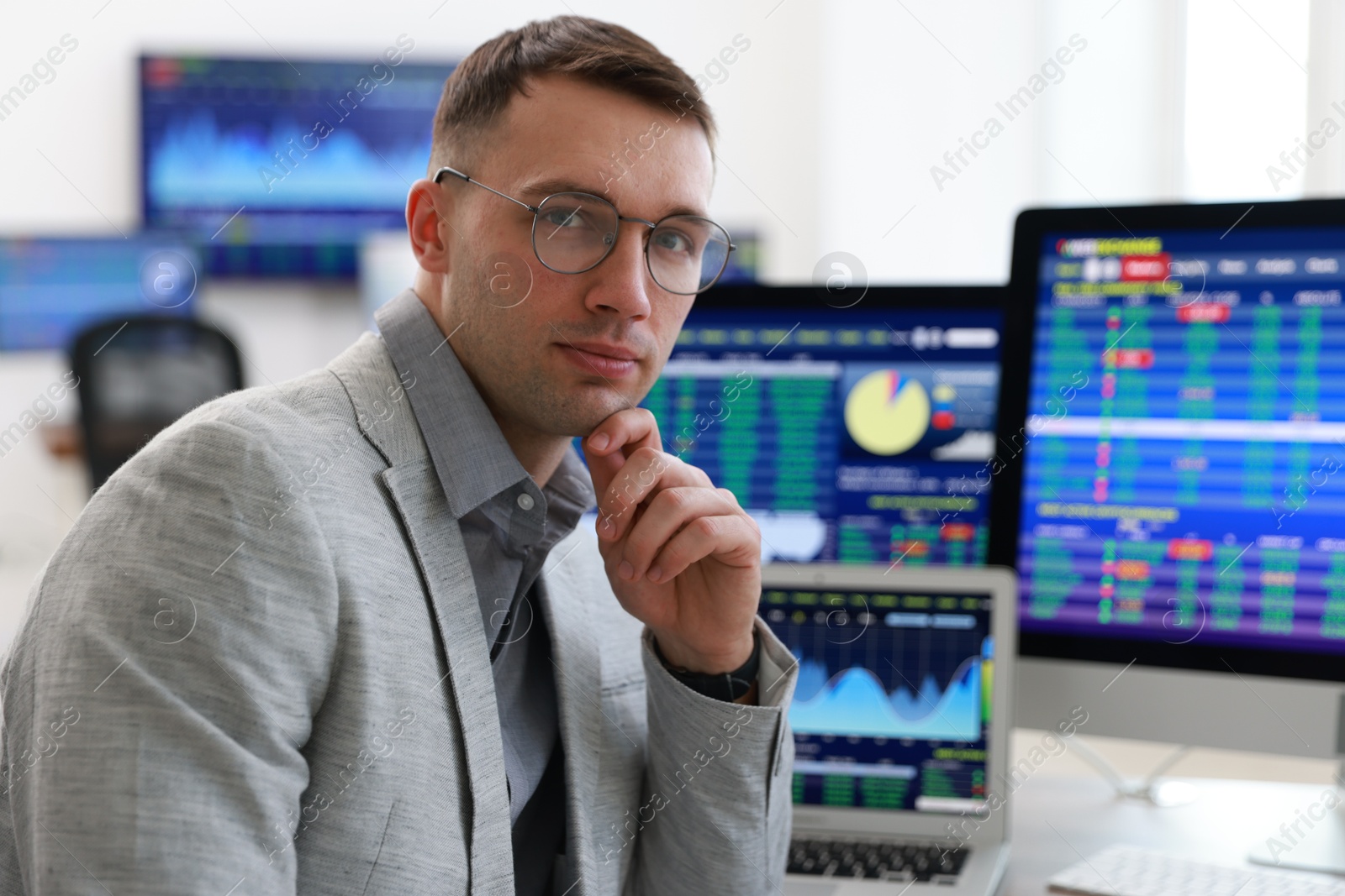 Photo of Portrait of financial trading specialist in office