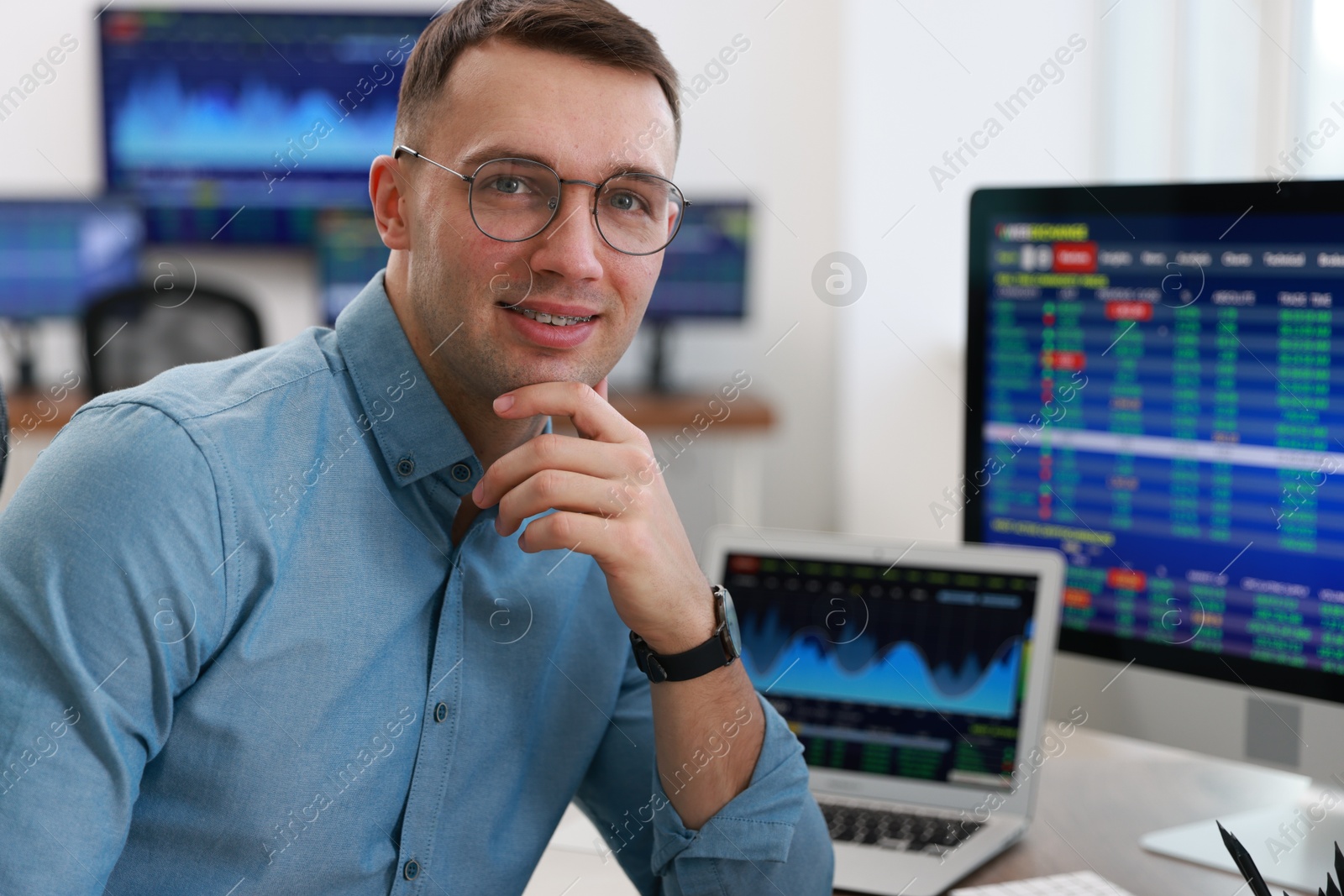 Photo of Portrait of financial trading specialist in office