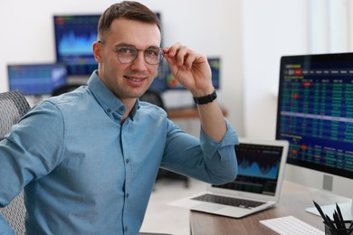 Photo of Portrait of financial trading specialist in office