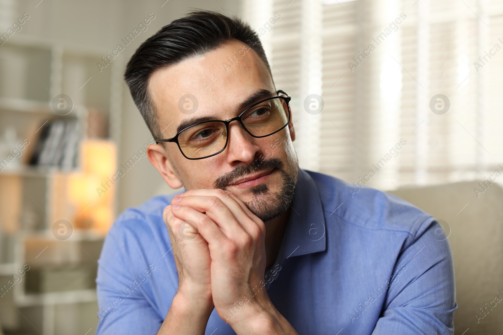 Photo of Portrait of handsome middle aged man indoors