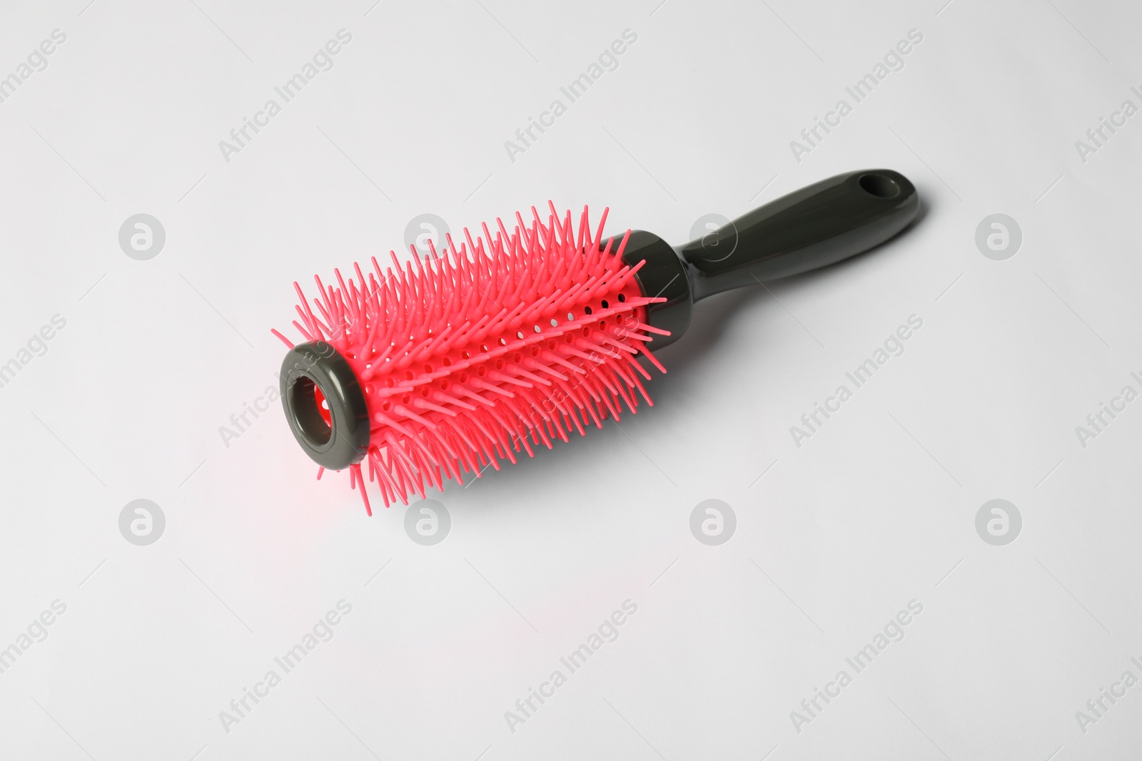 Photo of Hairdresser tool. Round brush on white background