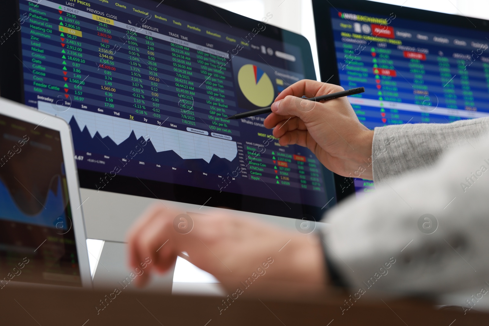 Photo of Financial trading specialist working with data in office, closeup