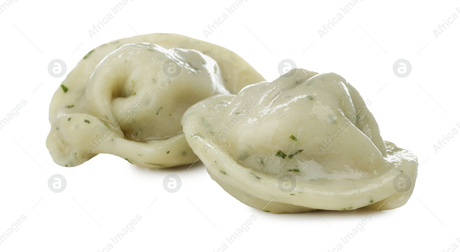 Photo of Delicious dumplings (pelmeni) with spices isolated on white