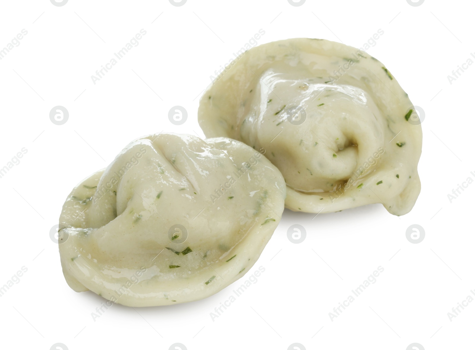 Photo of Delicious dumplings (pelmeni) with spices isolated on white