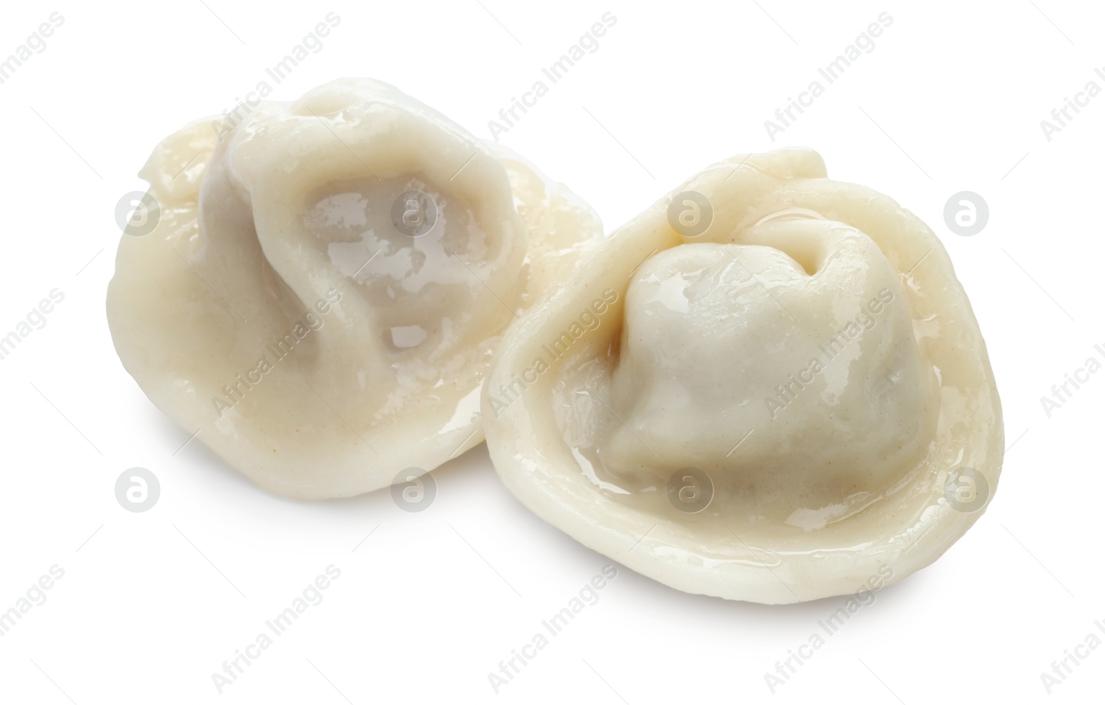 Photo of Delicious boiled dumplings (pelmeni) isolated on white