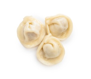 Photo of Delicious boiled dumplings (pelmeni) isolated on white, top view