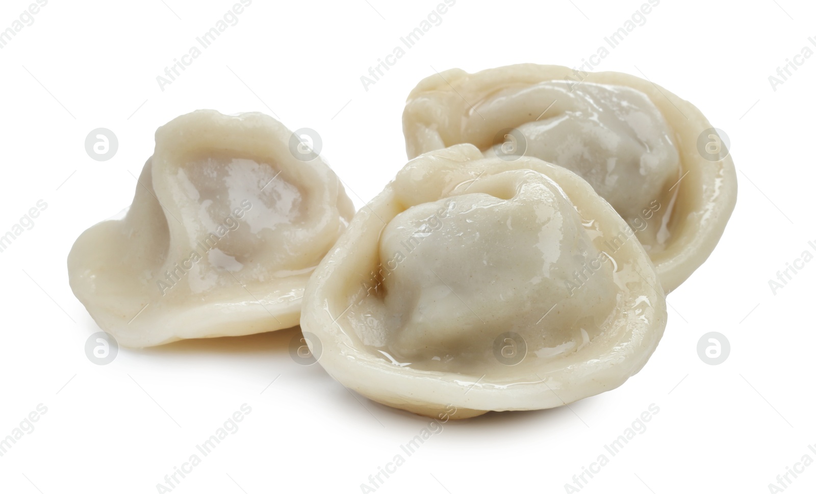 Photo of Delicious boiled dumplings (pelmeni) isolated on white