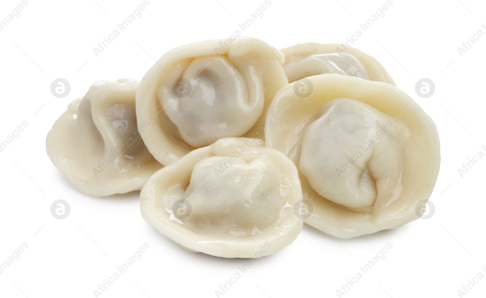 Photo of Delicious boiled dumplings (pelmeni) isolated on white