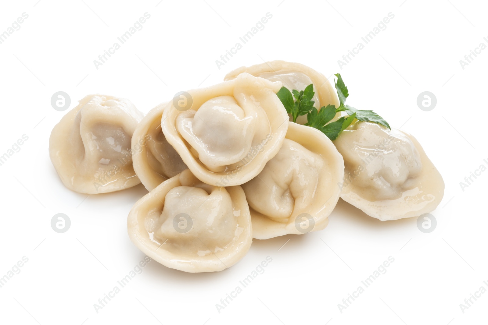 Photo of Delicious boiled dumplings with fresh parsley isolated on white