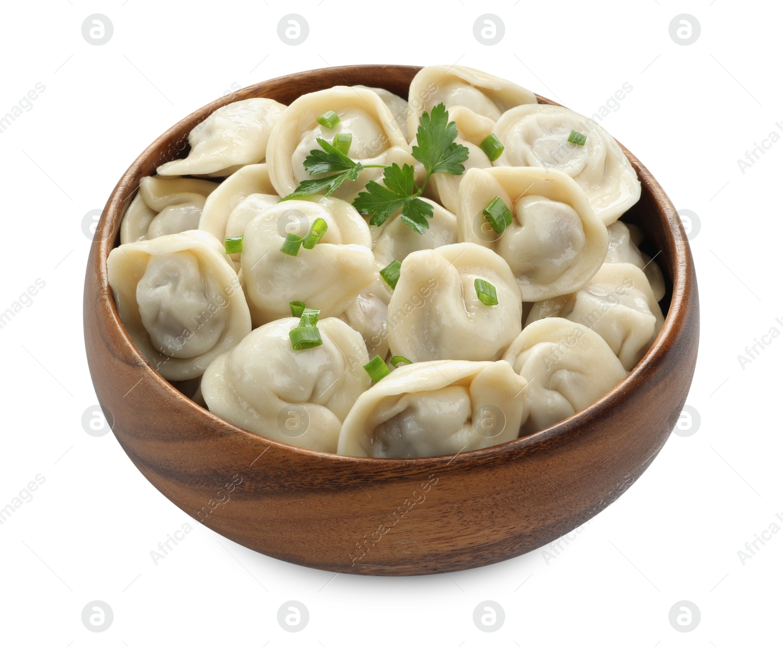 Photo of Delicious dumplings with fresh green onion and parsley in bowl isolated on white