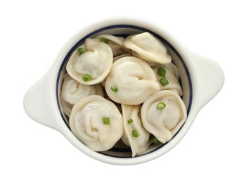 Photo of Delicious dumplings (pelmeni) with green onion in bowl isolated on white, top view