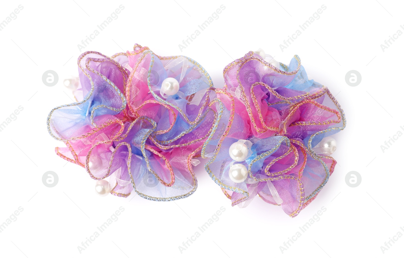 Photo of Two beautiful colorful hair scrunchies isolated on white, top view