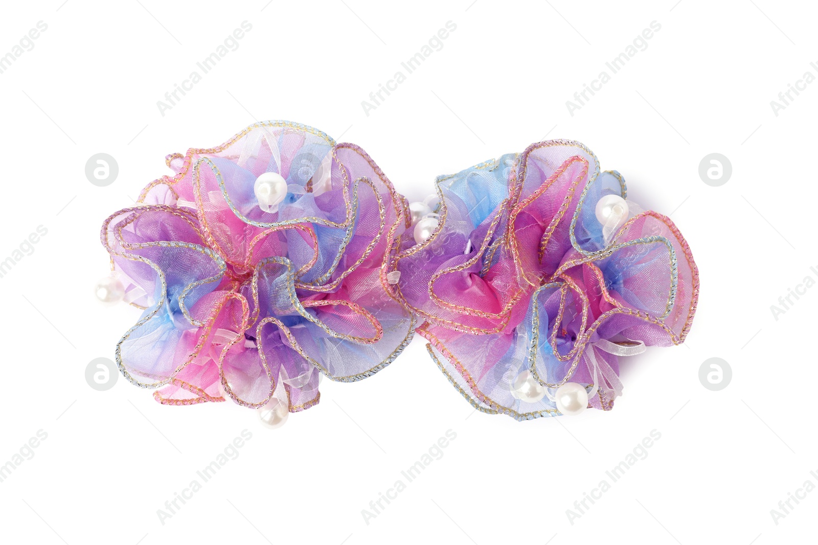 Photo of Two beautiful colorful hair scrunchies isolated on white, top view